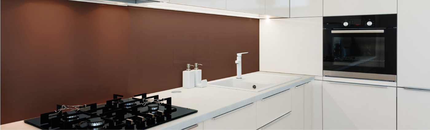 Brown glass splashback in a kitchen