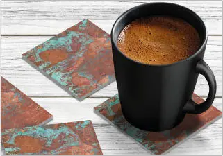 An acrylic coaster in the Aged Copper design